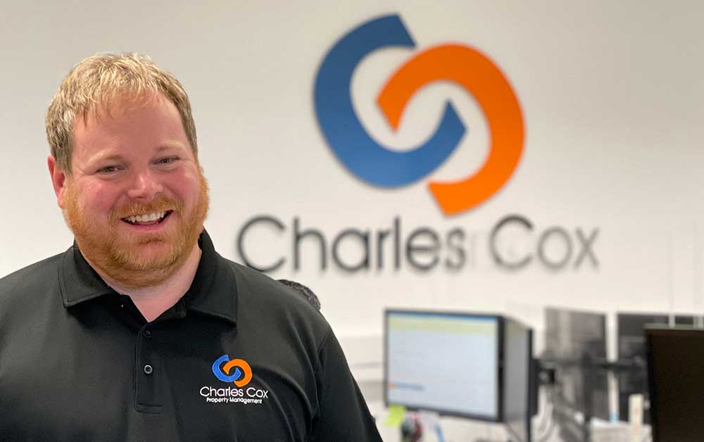 profile image of Matt Cox in his office smiling